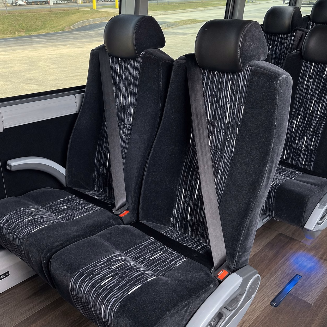 how trip distance and duration affect charter bus rates in aurora